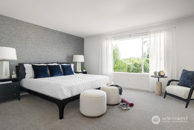 carpeted bedroom featuring multiple windows