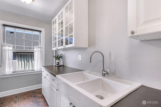 kitchen with white cabinets and sink