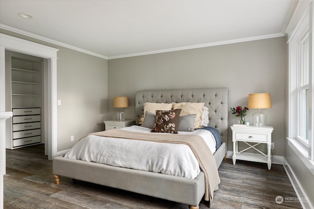 bedroom with ornamental molding and dark hardwood / wood-style floors