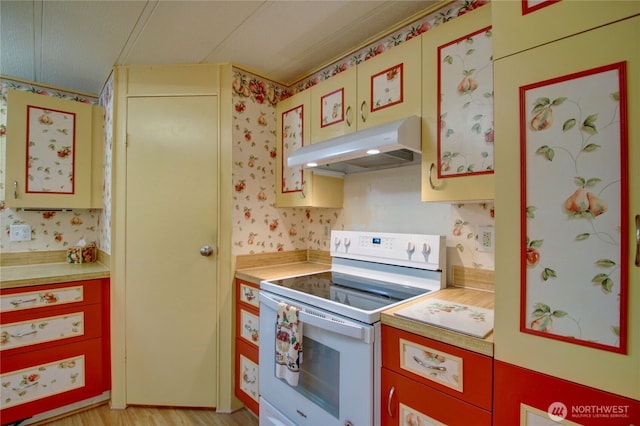 kitchen featuring white electric stove, light countertops, and under cabinet range hood