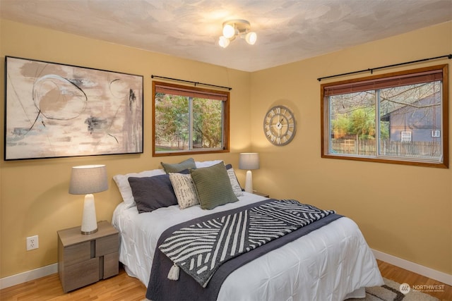 bedroom featuring light hardwood / wood-style floors