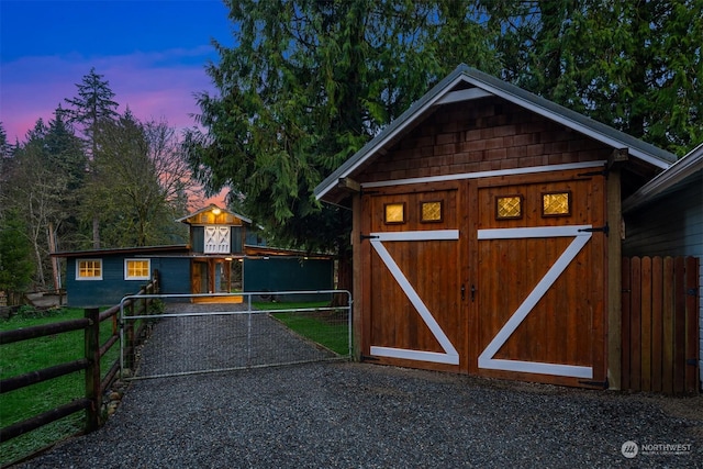 view of outdoor structure at dusk