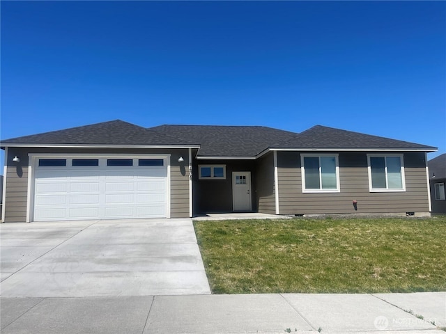 1404 W Century St, Moses Lake, WA 98837 - single story home featuring concrete driveway, a front lawn, an attached garage, and a shingled roof