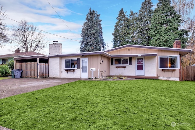 single story home featuring a front yard