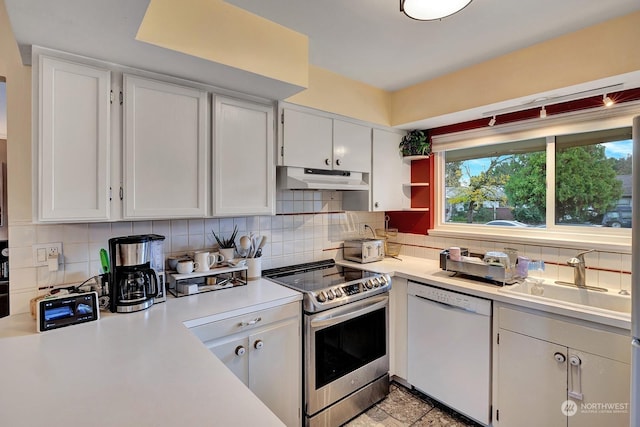 kitchen with stainless steel electric stove, white dishwasher, and white cabinetry