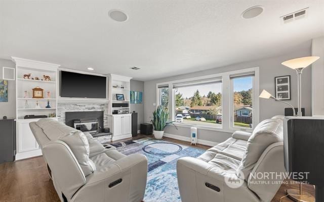 living room featuring dark hardwood / wood-style flooring