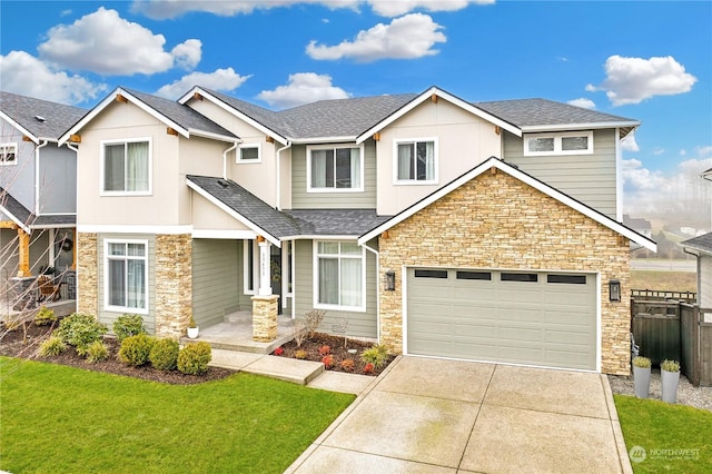 craftsman-style house featuring a front yard