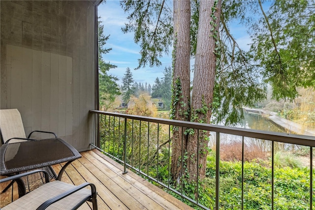 balcony featuring a water view