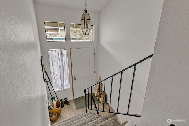 entryway with light hardwood / wood-style floors