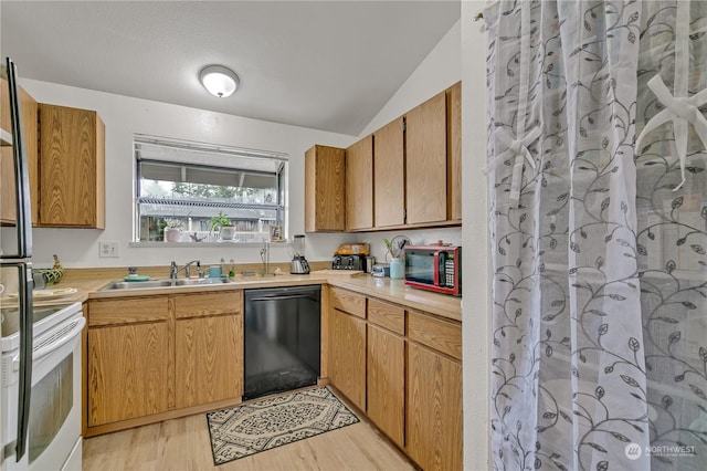 kitchen with black dishwasher, light wood-type flooring, vaulted ceiling, white electric stove, and sink