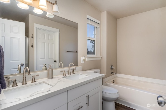 full bathroom with toilet, shower with separate bathtub, vanity, and wood-type flooring