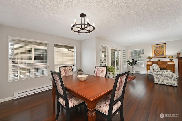 dining area featuring baseboard heating, a textured ceiling, dark hardwood / wood-style floors, and a chandelier