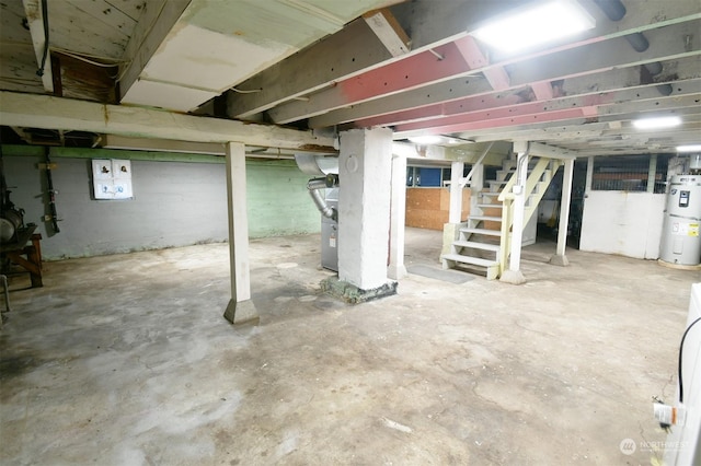 basement featuring electric water heater