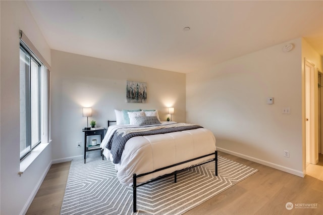 bedroom featuring light hardwood / wood-style floors