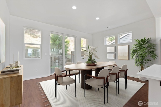 dining space with wood finished floors, recessed lighting, a healthy amount of sunlight, and baseboards