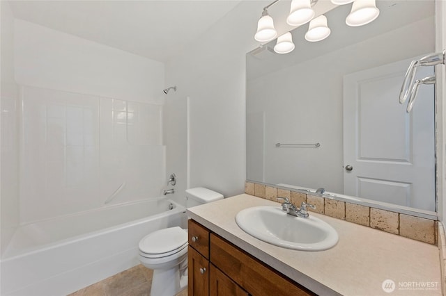 bathroom with vanity,  shower combination, and toilet