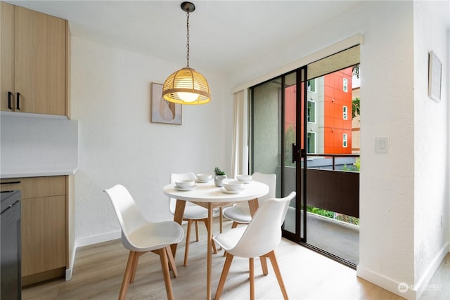 dining room featuring light wood-type flooring