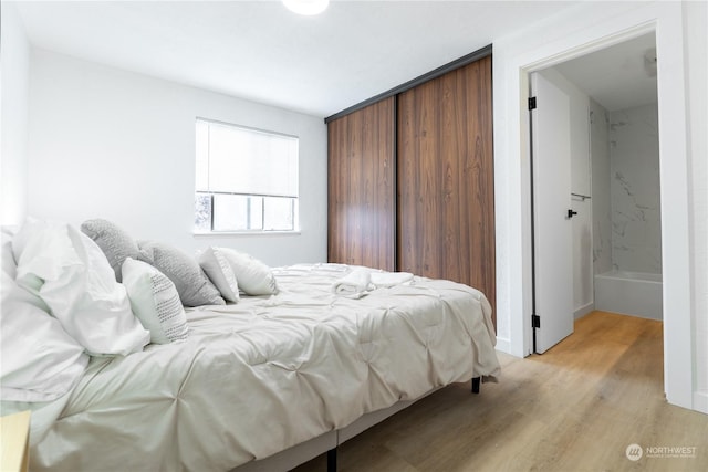 bedroom featuring light hardwood / wood-style flooring