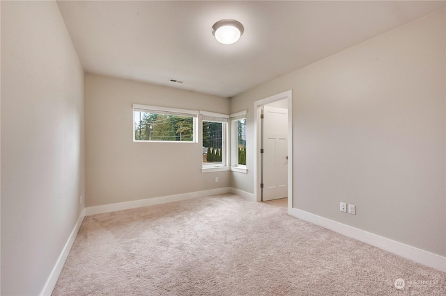 view of carpeted spare room