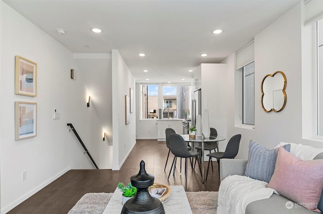 living room with dark hardwood / wood-style floors