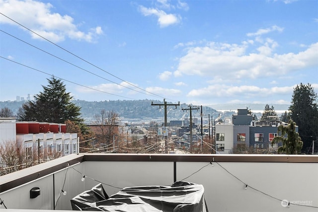 balcony featuring a mountain view