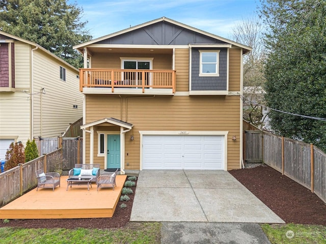 view of front of house with a garage, an outdoor living space, and a balcony