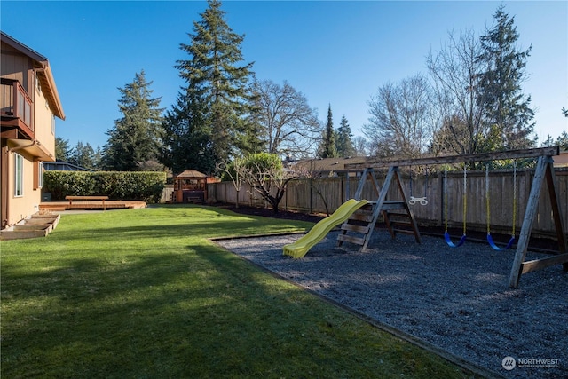 view of jungle gym with a lawn