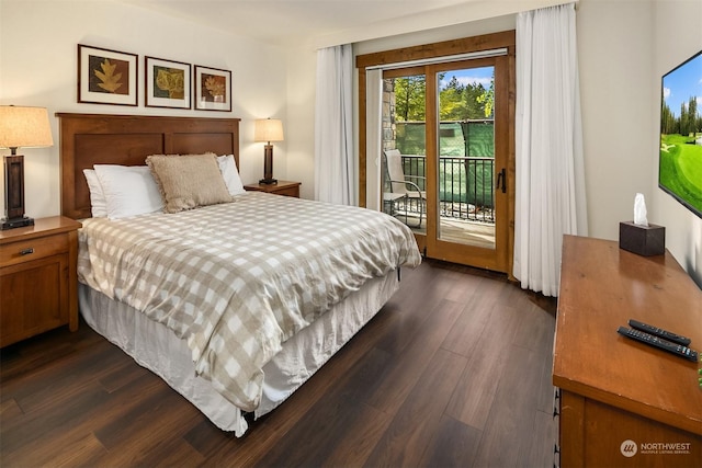 bedroom featuring dark wood-type flooring and access to outside