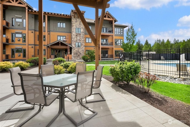 view of patio / terrace with a community pool