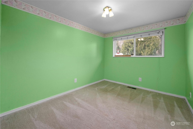 view of carpeted spare room