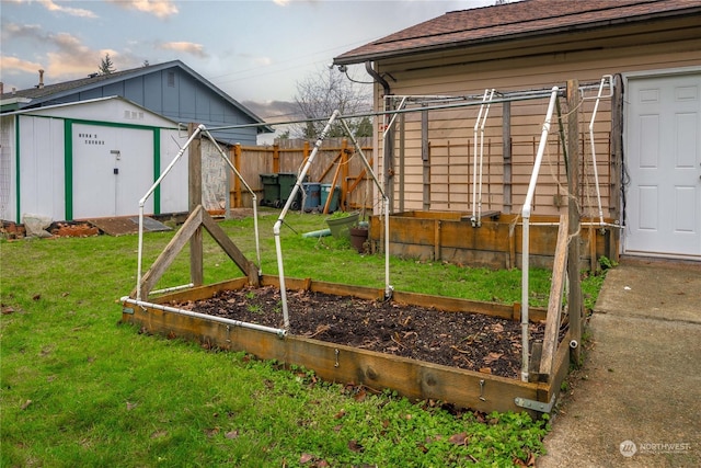 view of jungle gym featuring a shed and a lawn