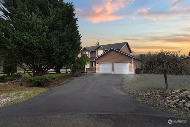 view of front of property featuring a garage