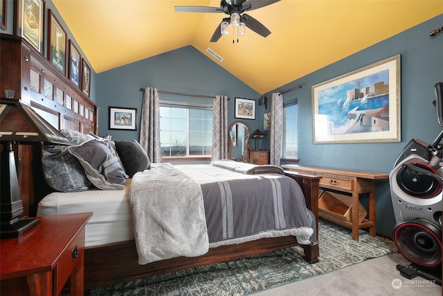 bedroom with vaulted ceiling, carpet floors, and ceiling fan