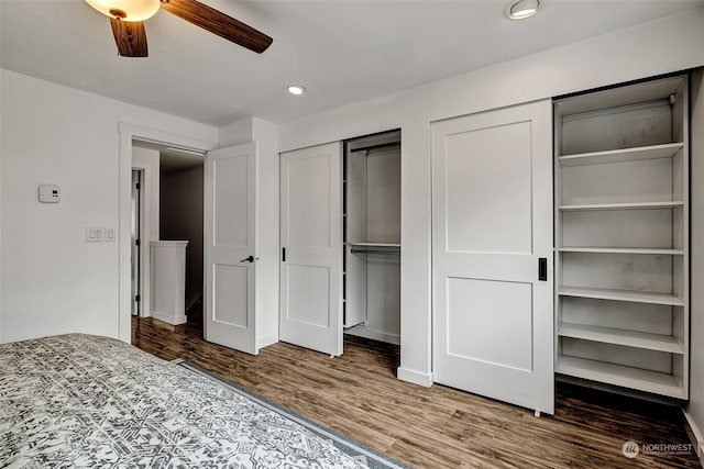 unfurnished bedroom featuring ceiling fan and hardwood / wood-style flooring