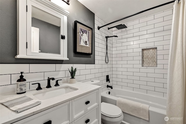 full bathroom with shower / bath combination with curtain, toilet, vanity, tile walls, and backsplash