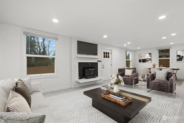 carpeted living room with a wealth of natural light