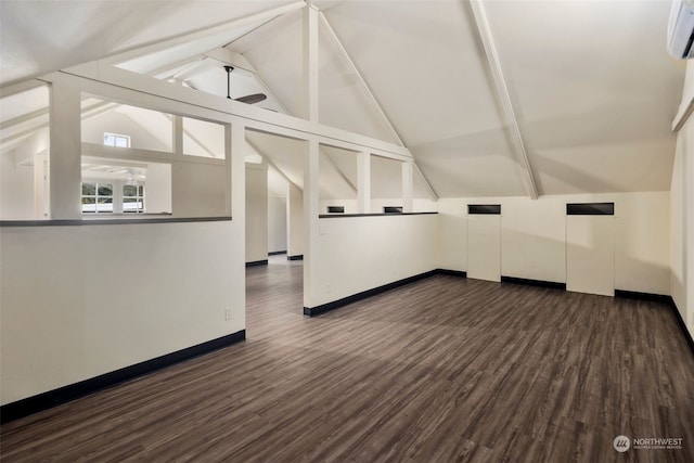 additional living space with lofted ceiling and dark hardwood / wood-style floors