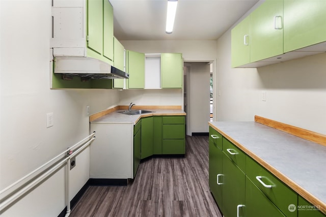 kitchen with sink and green cabinetry