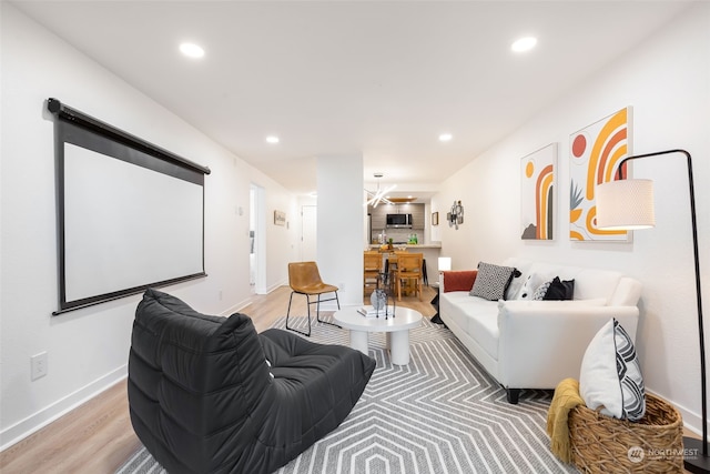 home theater featuring light hardwood / wood-style flooring