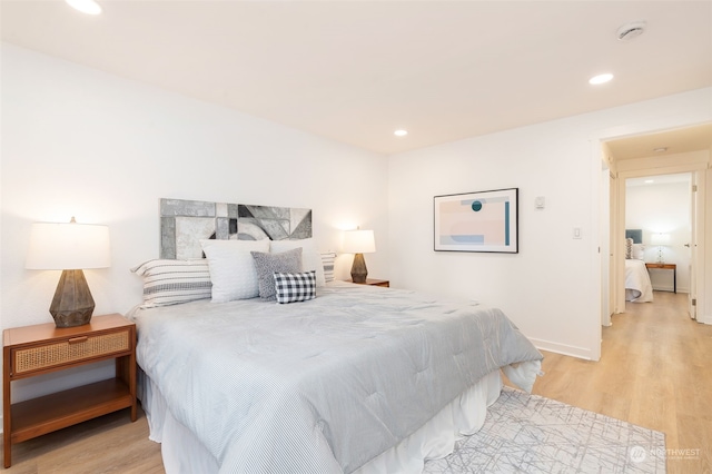 bedroom with light wood-type flooring