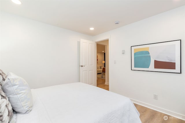 bedroom featuring light hardwood / wood-style flooring