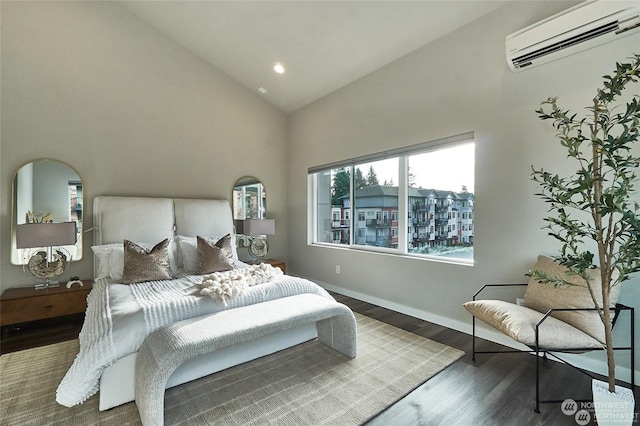 bedroom featuring baseboards, recessed lighting, wood finished floors, high vaulted ceiling, and a wall mounted AC