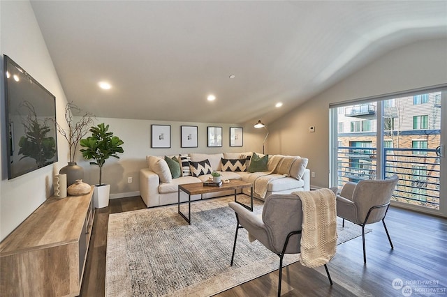 living room featuring vaulted ceiling, recessed lighting, dark wood-style flooring, and baseboards