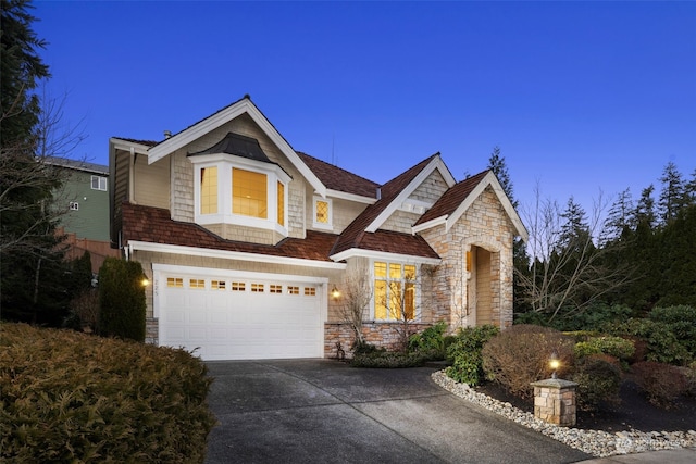 view of front of home with a garage