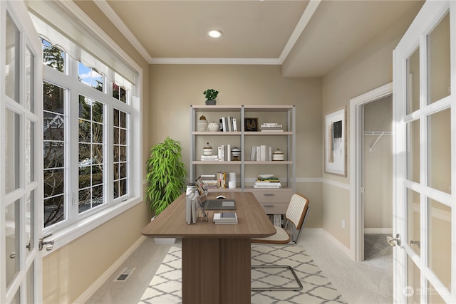 carpeted office space with crown molding and french doors