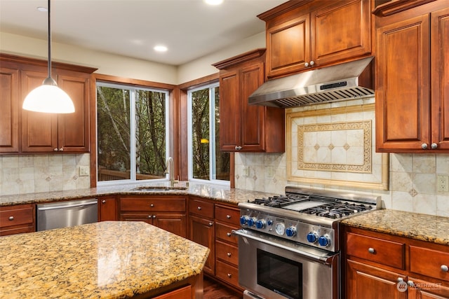 kitchen featuring decorative light fixtures, sink, stainless steel appliances, ventilation hood, and light stone counters