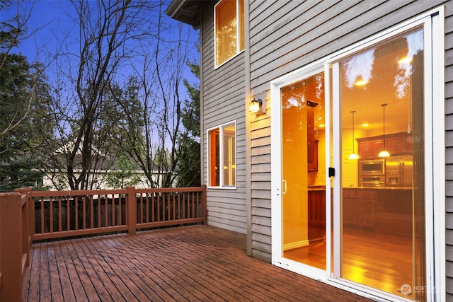 view of deck at dusk