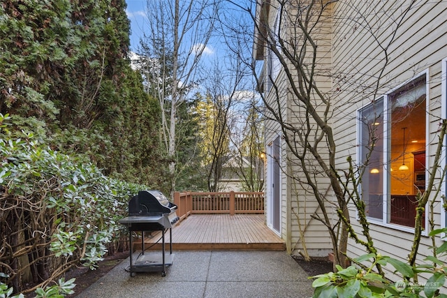 view of patio / terrace with a deck and area for grilling