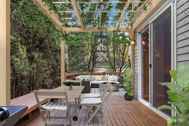 wooden deck with an outdoor living space and a pergola