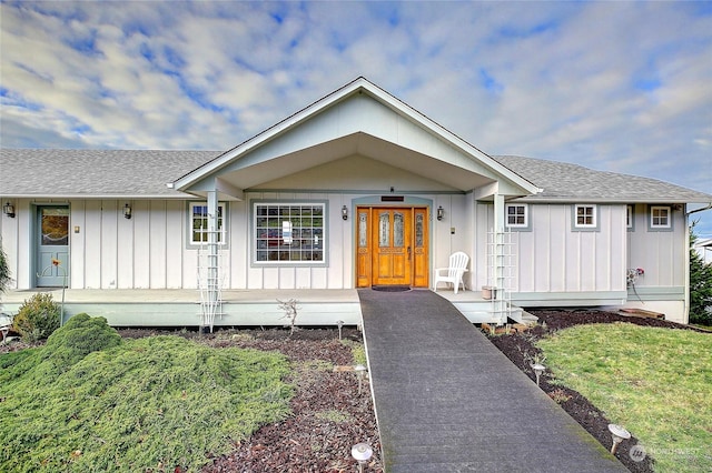 single story home featuring a porch